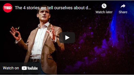 A man in a brown blazer gives a TED Talk on stage, holding a remote, as he shares four stories about death against a backdrop of blue and purple projected lights. | Andrew T. Austin | Metaphors of Movement