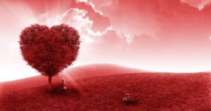 A child sits under a heart-shaped tree on a grassy hill with a toy nearby; the scene is tinted red and illuminated by sunlight through clouds. | Andrew T. Austin | Metaphors of Movement